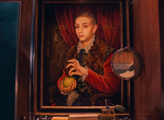 Grand budapest hotel boy with apple