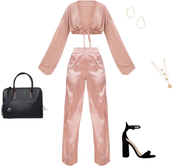 Hailey Baldwin outfit with satin top, satin pants, black strappy heels, top handle bag, gold jewelry