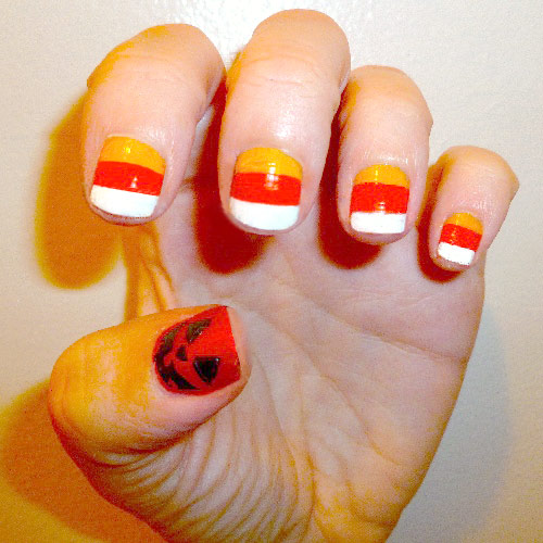 Halloween nail art: Candy corn and jack-o-lantern