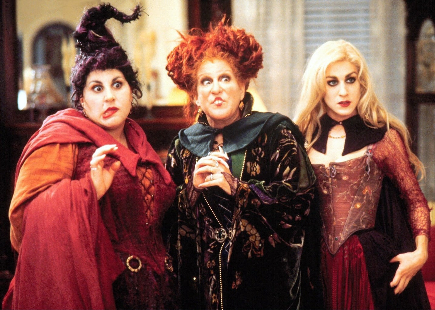 Hocus Pocus - screenshot of the Sanderson sisters dressed in their witch robes in the movie