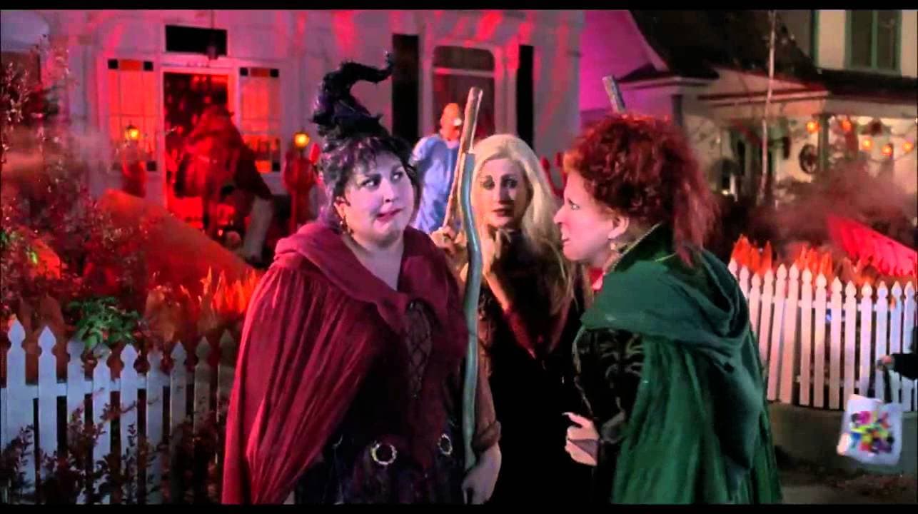 Screenshot of the Sanderson sisters outside trick or treating in Hocus Pocus