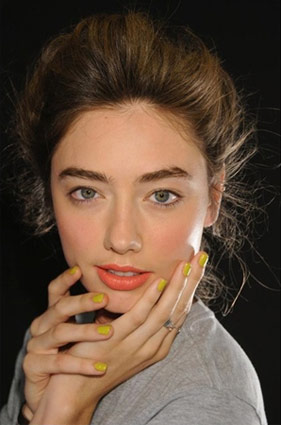 Yellow nail polish at Karen Walker