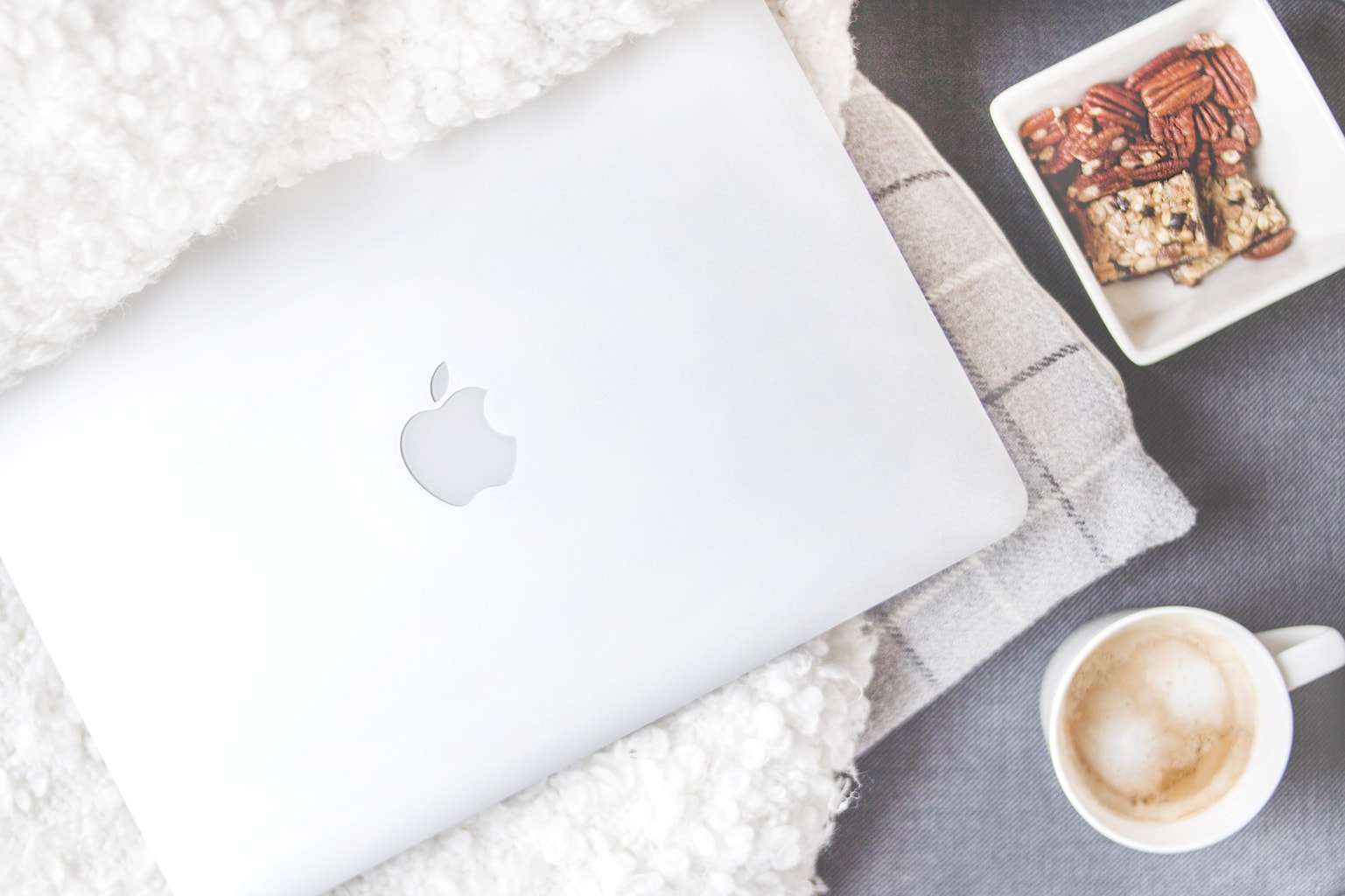 Laptop and coffee and snacks