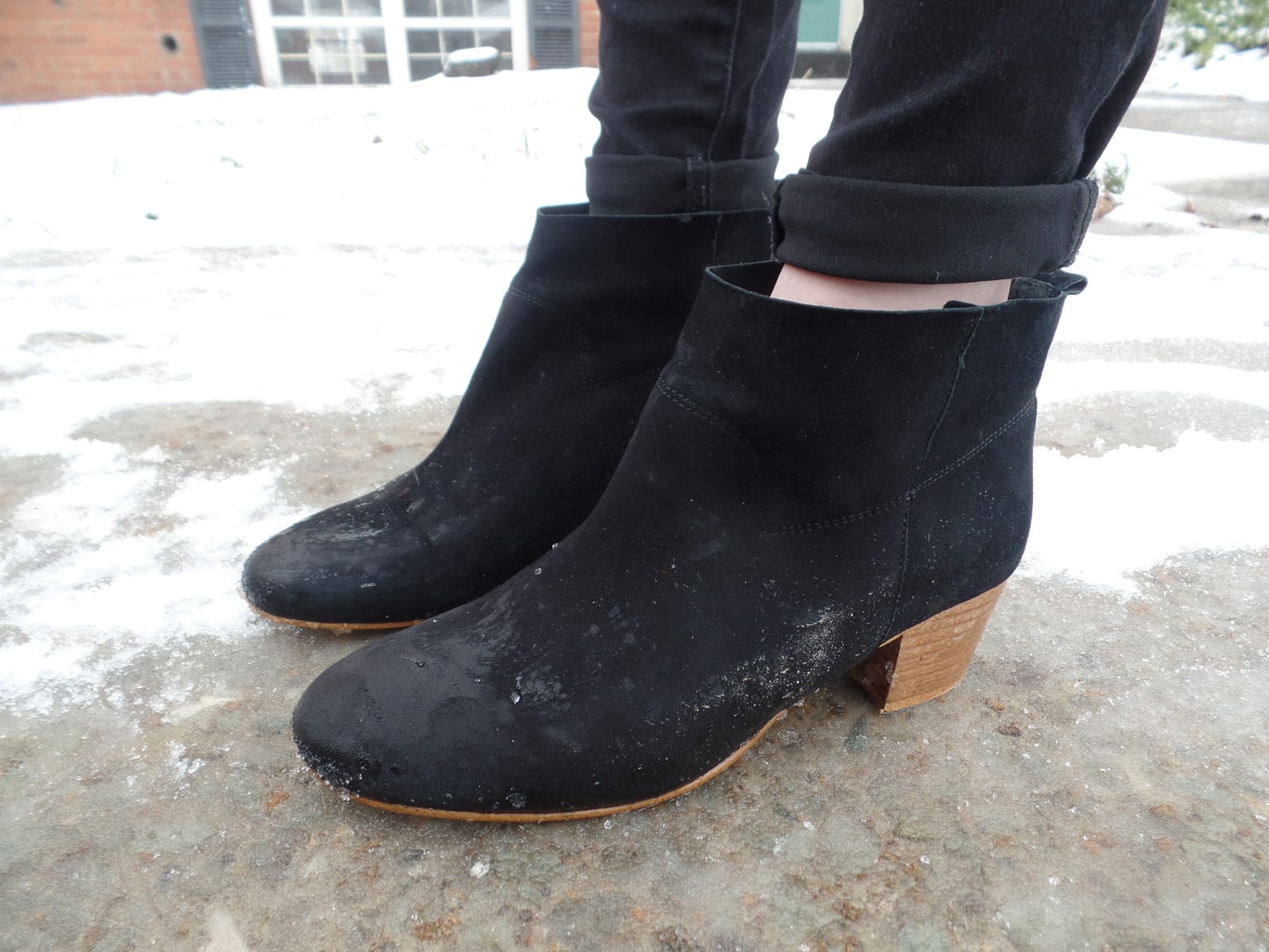 Mercyhurst University student Chloe wears short black chunky-heeled booties.