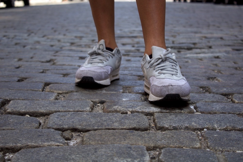 College student fashion trends: Classic gray Nike sneakers