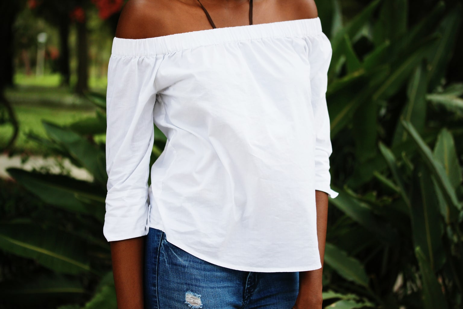 This off-the-shoulder white flowy top is great for warm weather days.