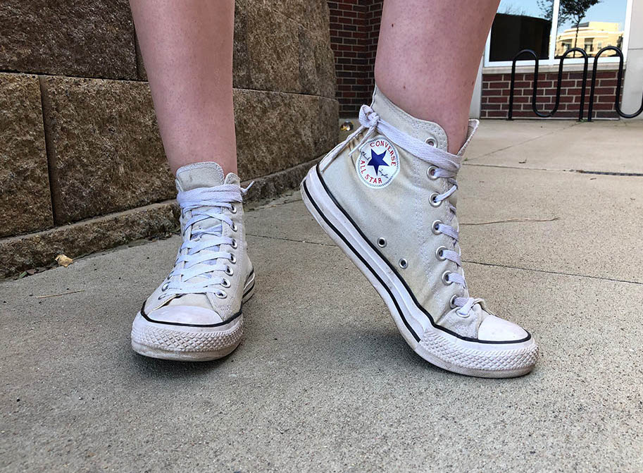 These high top grey Converse sneakers are perfect for running around campus.