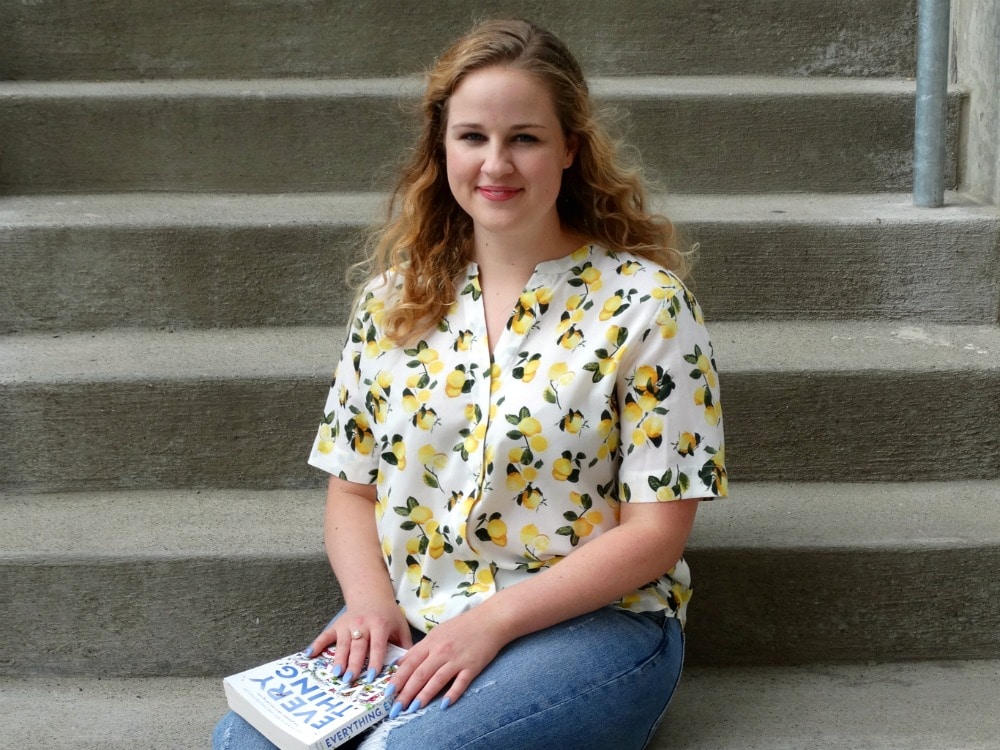 Student wears a summer button-up blouse with lemon print.