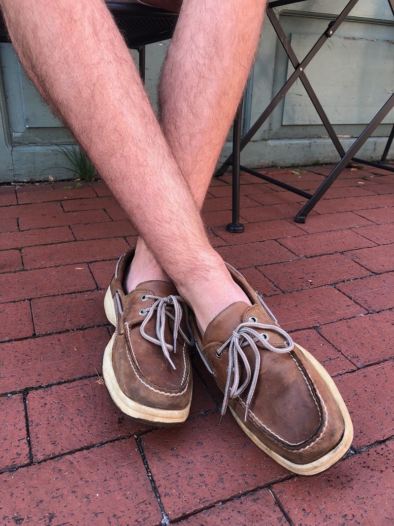 West Virginia University student Nathan wears brown leather Sperry boat shoes with light tan stitching and laces.