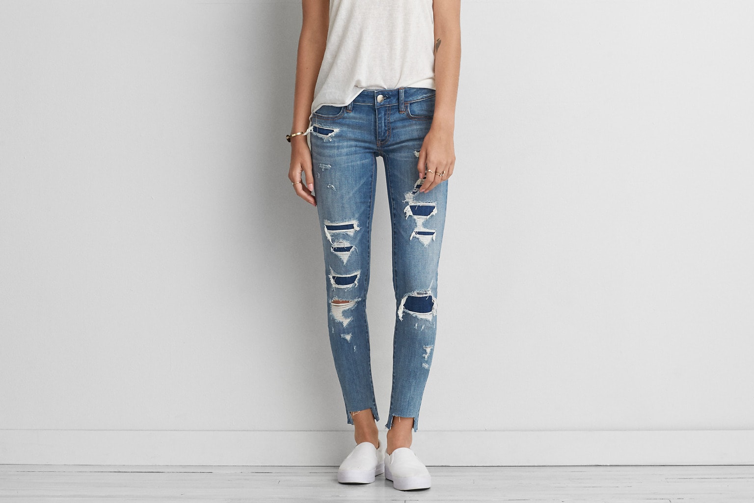 Distressed and patched skinny jean