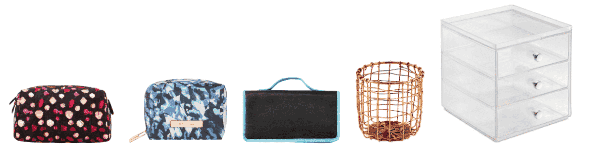 Black make-up bag with pink and red jewels, blue-and-green make-up case with gold hardware, black brush roll with aqua-blue trim, copper pencil cup, clear plastic triple-decker drawers