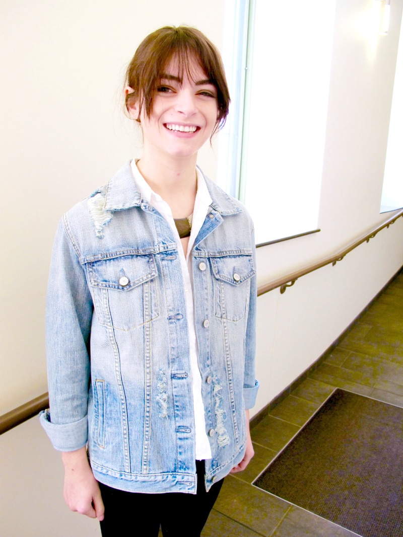Fashion on campus at MSU: Denim jacket, white button-down shirt, statement necklace