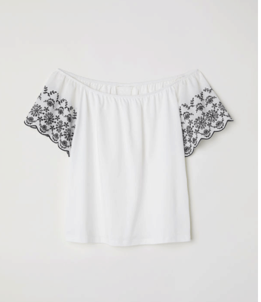 white off the shoulder shirt with embroidery