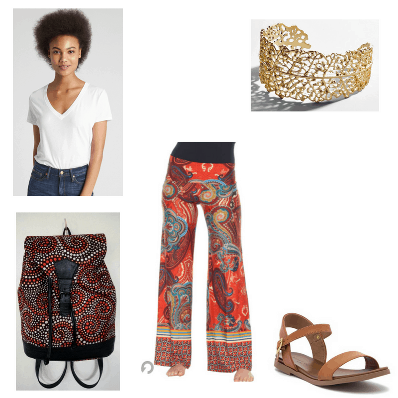 Outfit with white v-neck, orange palazzo pants, brown sandals, printed backpack, and gold cuff