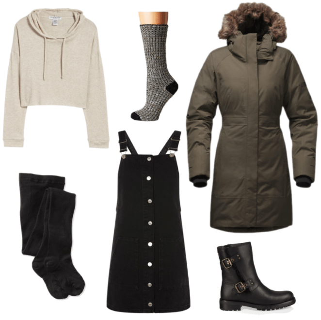 How to wear a parka and still look stylish: Outfit with long brown parka with fur hood, black overall dress, cropped hoodie, wool socks, black fleece lined tights, chunky ankle boots