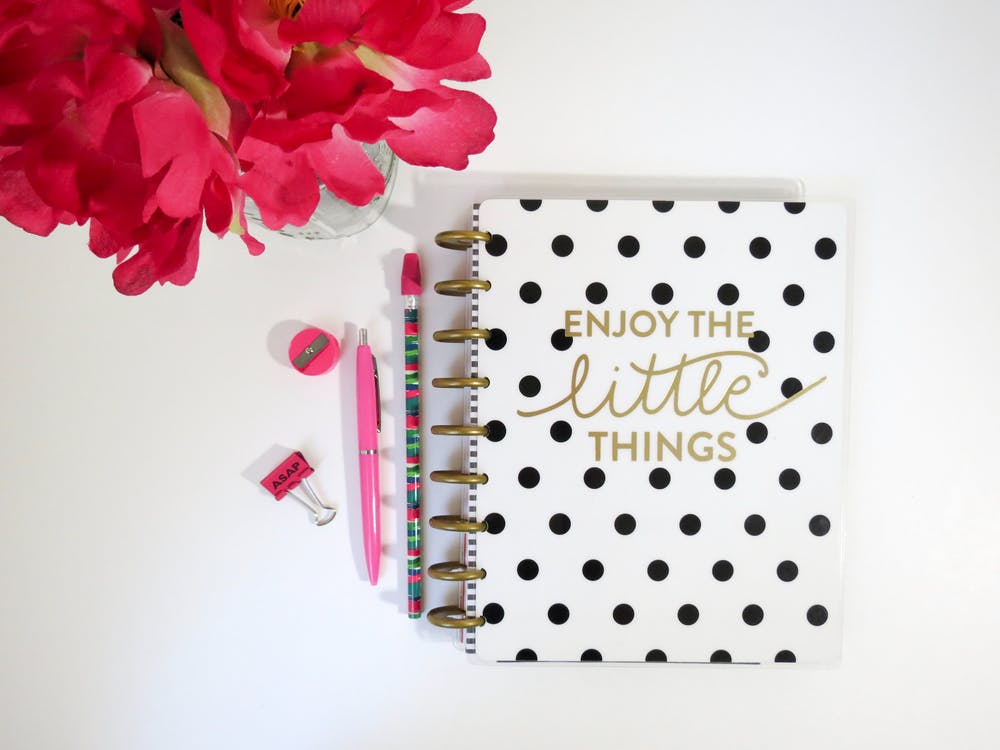 black and white planner with flowers