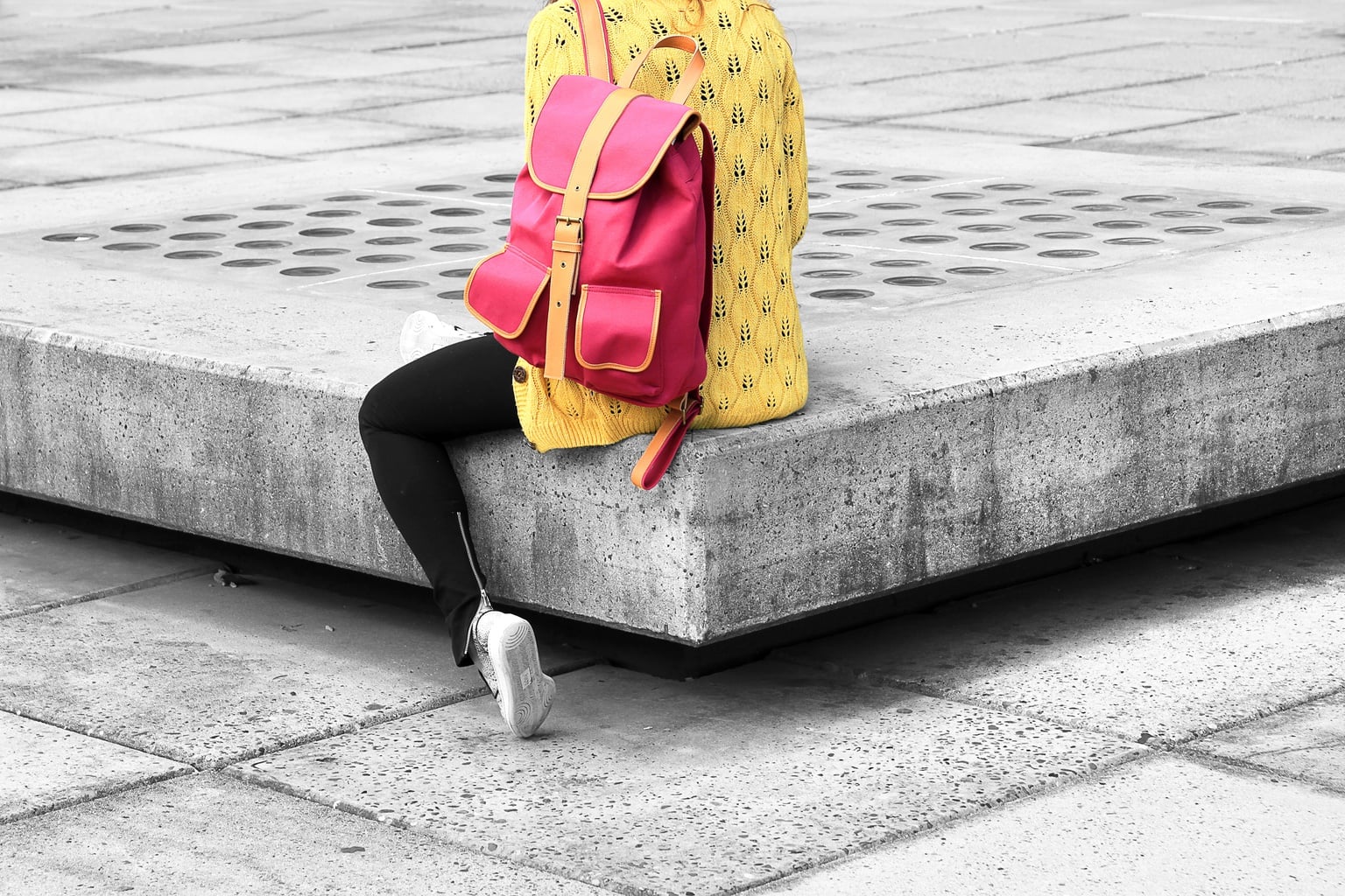 Student with a pink backpack