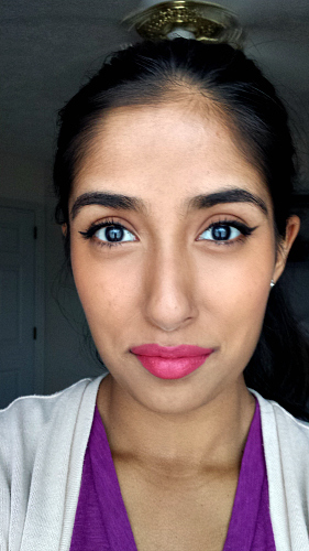 New Year's makeup look with pink lips