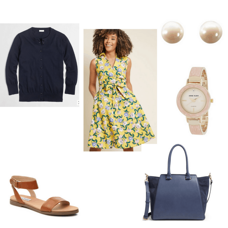 Summer work outfit with floral yellow shirtdress, navy cardigan, brown sandals, pearl earrings, watch, and navy satchel