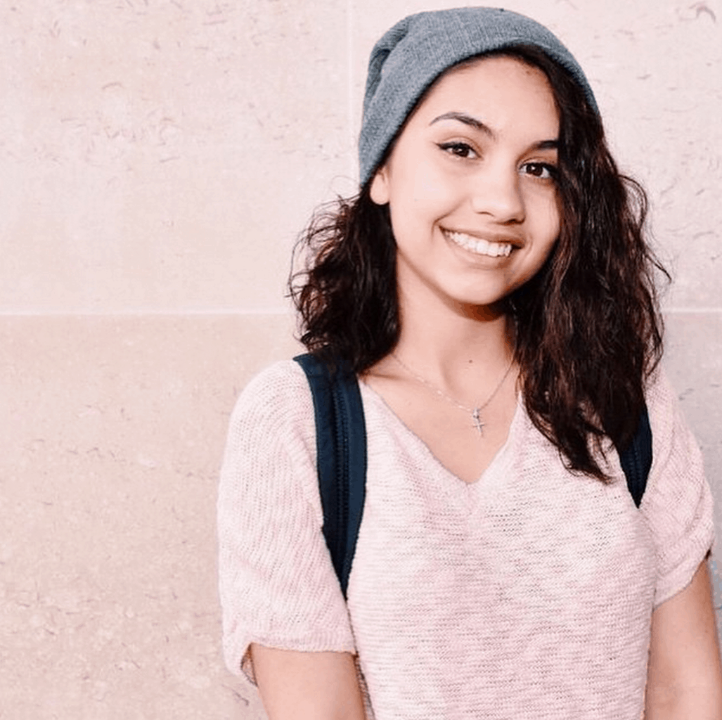 Alessia Cara beanie and pink top