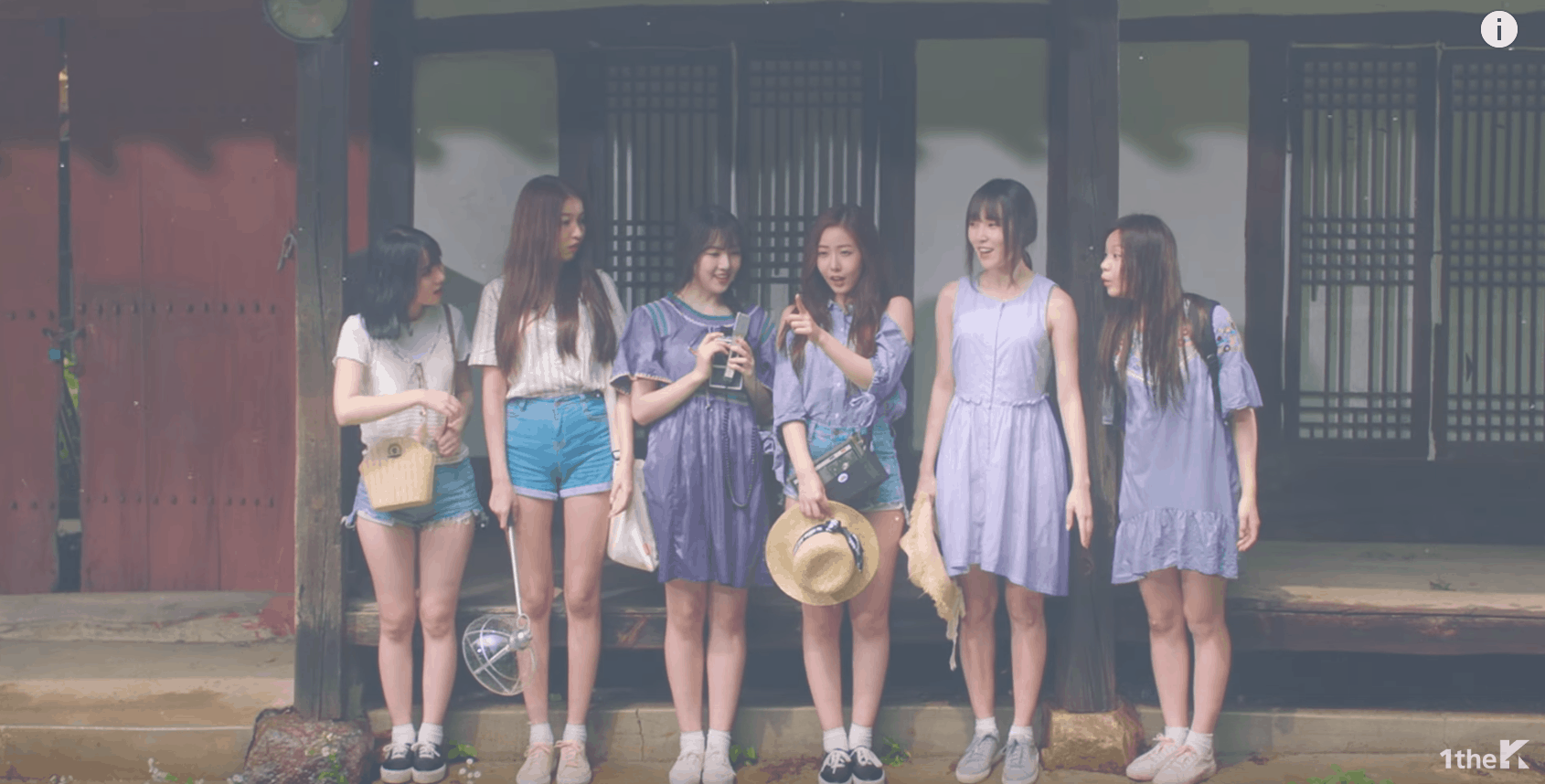 GFRIEND Love Whisper music video: The girls standing in a line wearing cute summer dresses and denim shorts