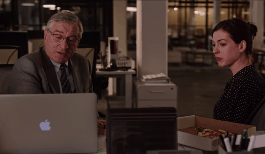 The Intern movie: Ben and Jules at the computer