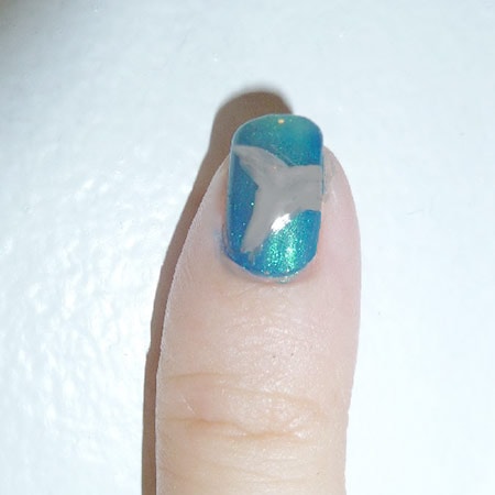 Shark tail pinky nail