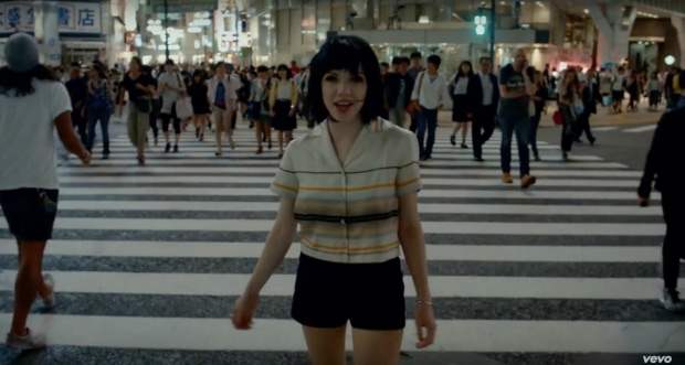 Carly Rae Jepsen shorts and striped button-up