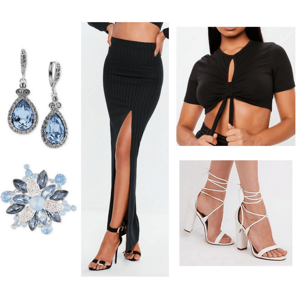 Black slitted maxi skirt with black crop top, white heels, baby blue earrings and brooch