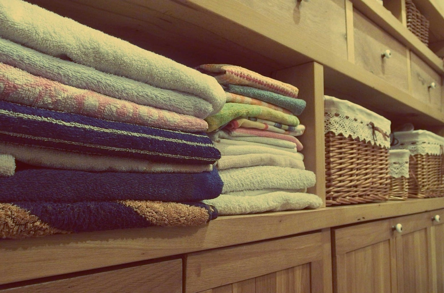 Towels nicely organized on a shelf