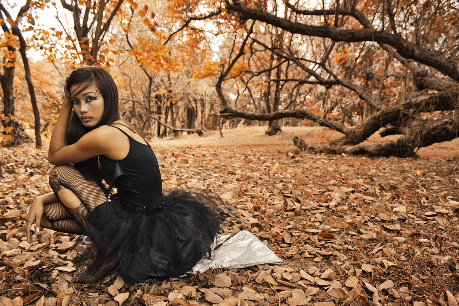 Halloween outfit - picture of a girl wearing a black ballerina outfit outside in the woods