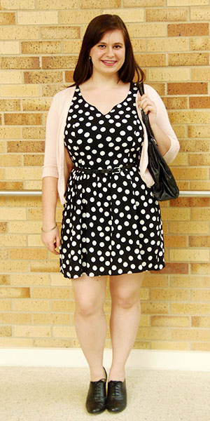 Texas A&M University student fashion - polka dot dress, pink cardigan, oxfords