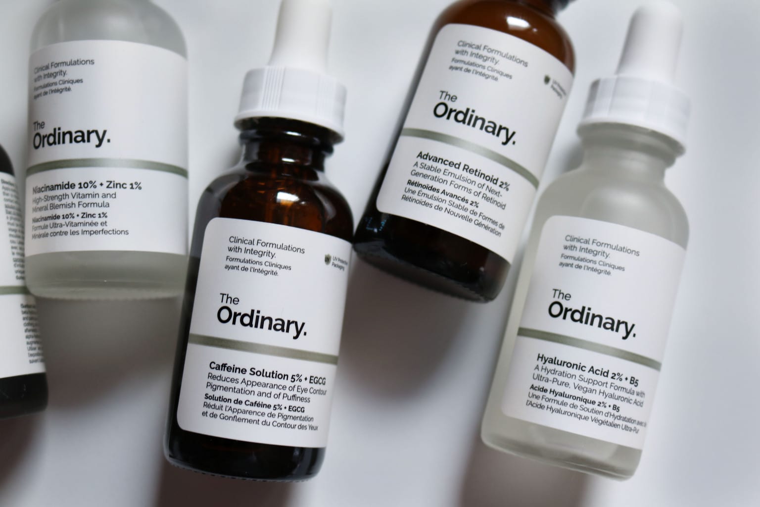 The Ordinary Skincare: Close ups for Caffeine Solution, Advanced Retinoid, Hylauronic Acid bottles