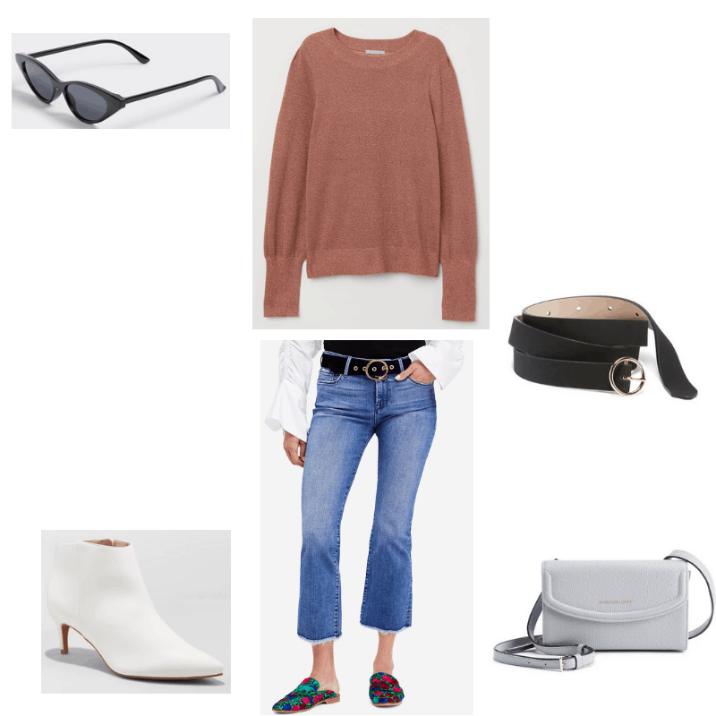 Outfit with pink sweater, frayed jeans, cat-eye sunglasses, o-ring belt, white kitten heel boots, and mini crossbody