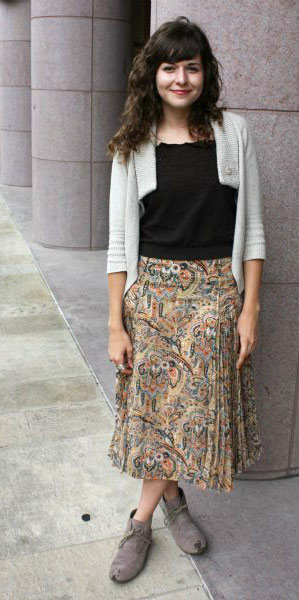Fashionable student street style at the University of Texas at Austin: Maxi skirt, cardigan, boho bag, unique jewelry