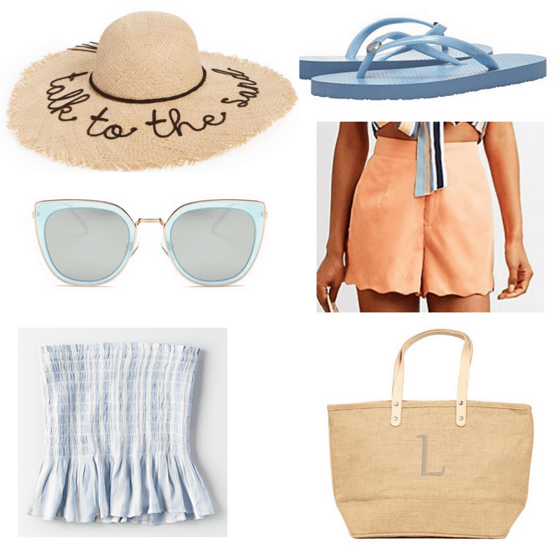 Blue top, sandals and sunglasses, coral shorts and straw bag and hat.