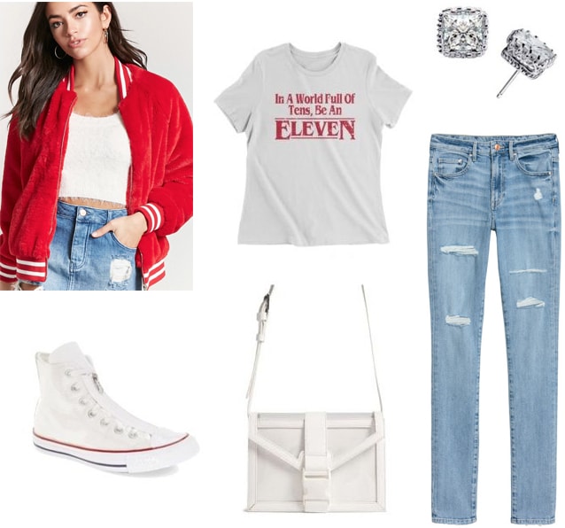 How to wear a varsity jacket to class: Outfit with light wash jeans, Eleven from Stranger Things tee shirt, faux diamond stud earrings, high top white converse sneakers, red varsity jacket, white purse