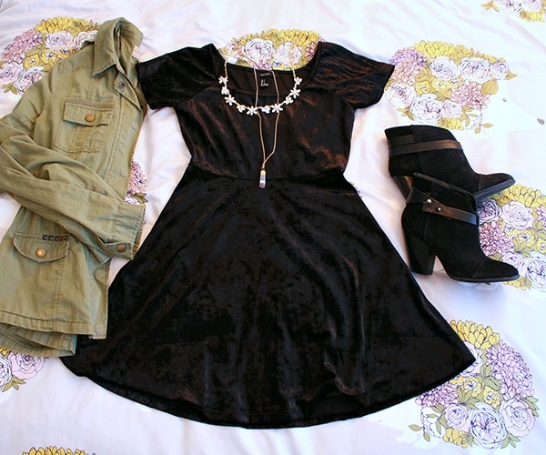 Velvet black dress green utility jacket layered necklaces black ankle boots