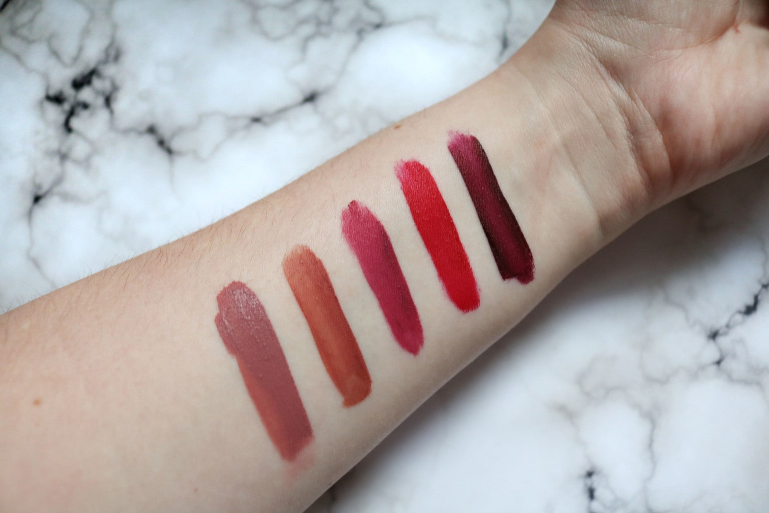 Wet n Wild catsuit swatches: Rebel Rose, Give Me Mocha, Berry Recognize, Missy and Fierce, Video Vixen