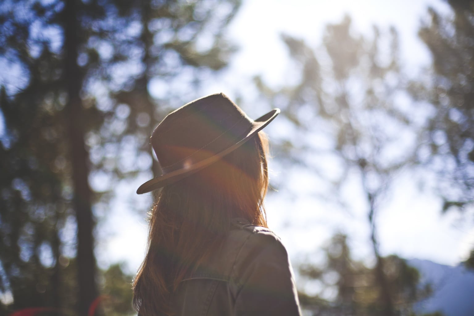 Woman wearing a hat outdoors