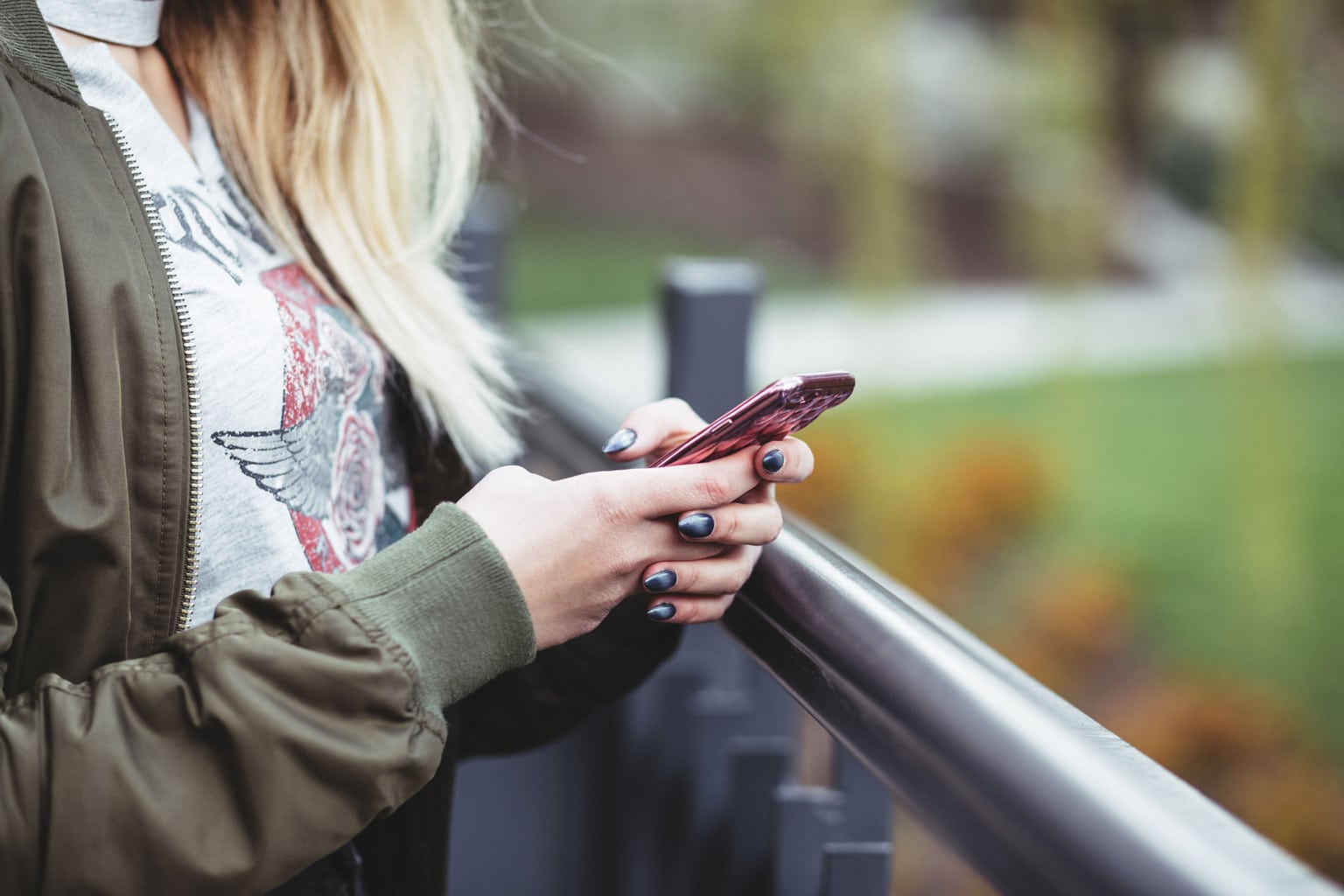 Woman traveling alone and using her phone