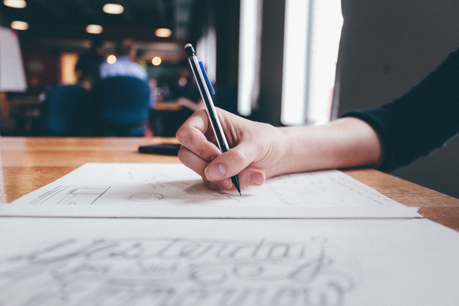 Woman writing something down