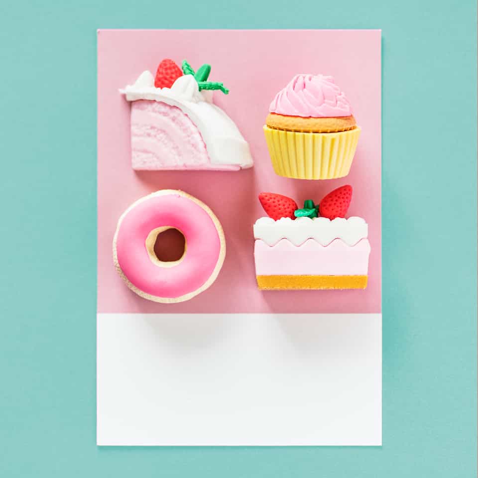 Birthday card with 3D pink cake slices, cupcake and donut