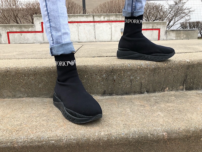 College student Kevin rocks black sock sneakers from Emporio Armani