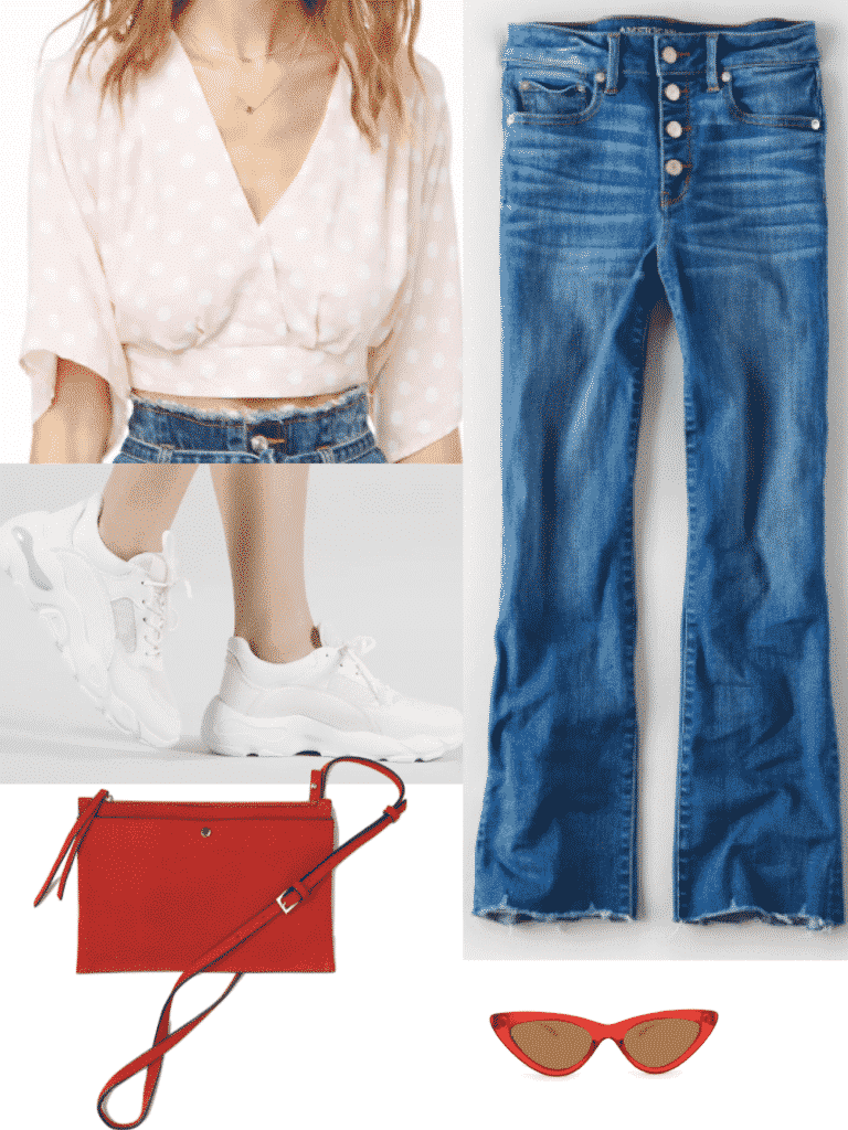 Hailey Bieber outfit with medium wash flare jeans, pink polka dot top, white sneakers, 