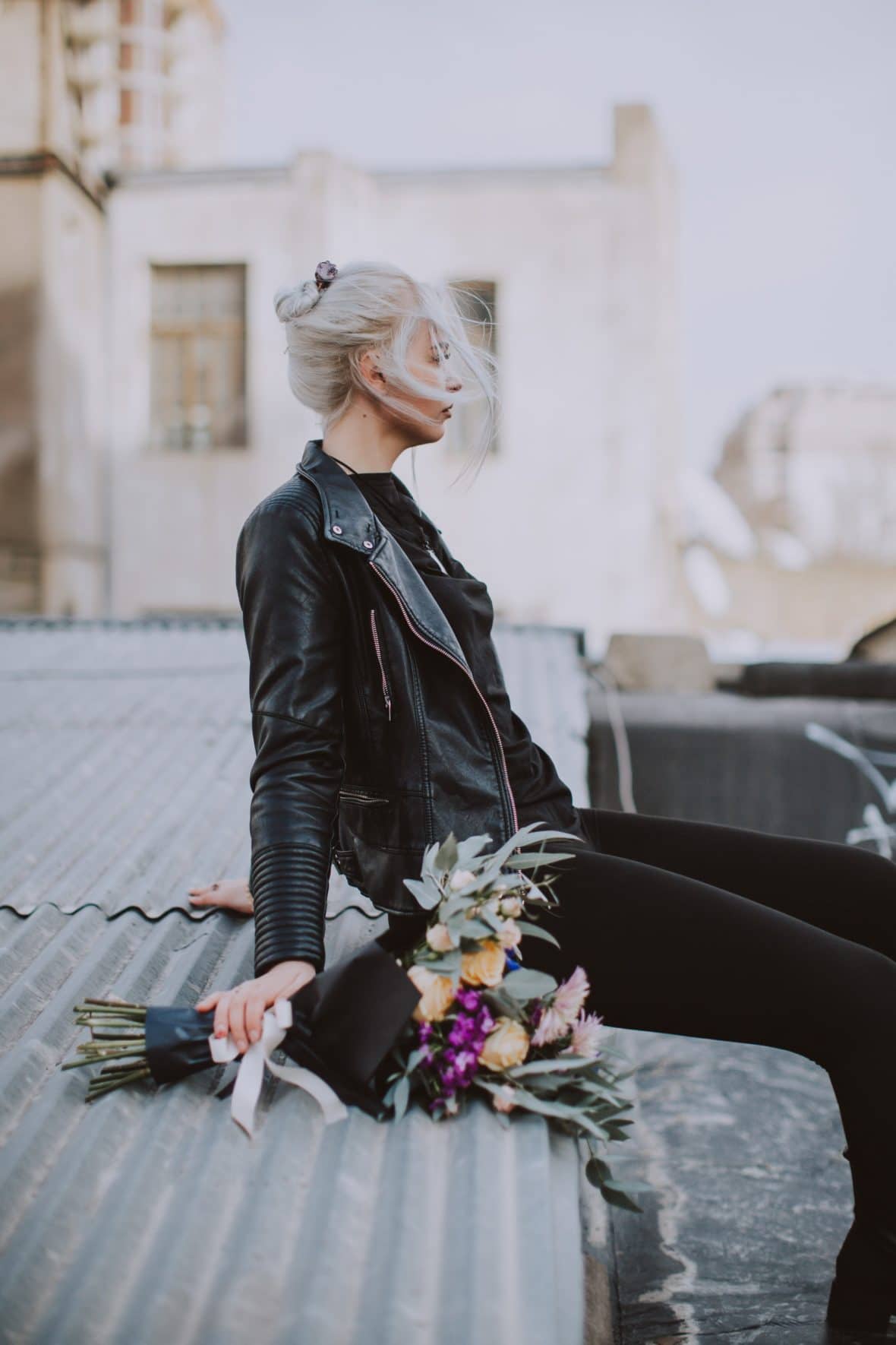 Girl wearing a leather jacket