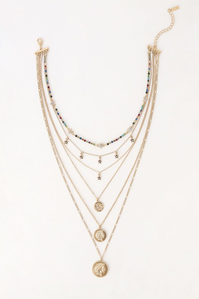 Layered gold necklace with stars