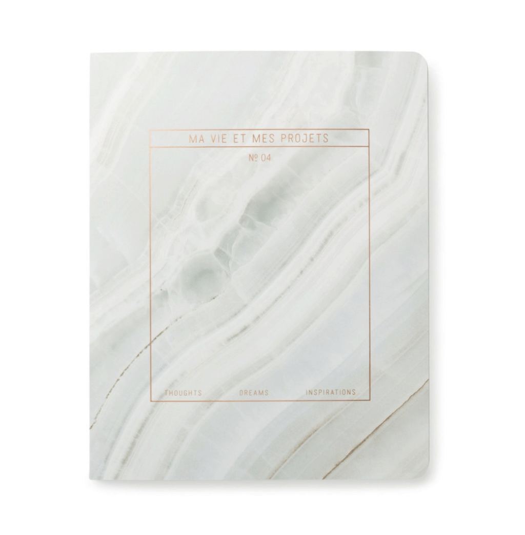 white and grey marble notebook