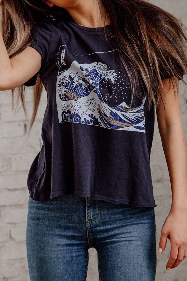 Graphic tee with wave print on it