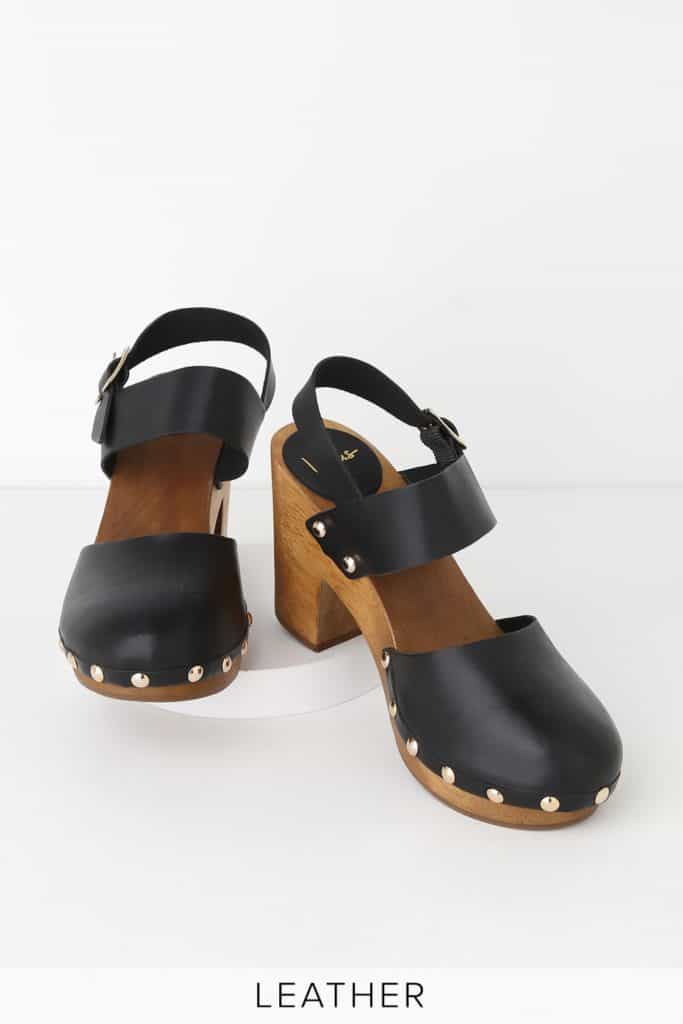 Black heeled wooden clogs with silver studs